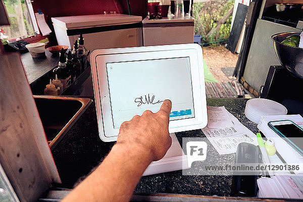 Digital screen for food orders and payment at eatery