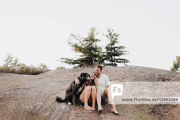 Couple with pet dog  Algonquin Park  Canada