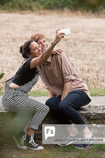 Friends taking selfie in countryside