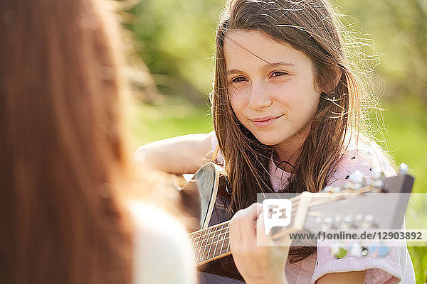 Girl playing guitar