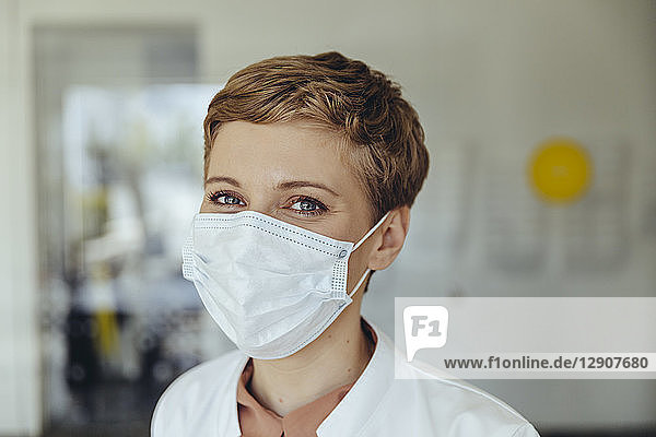 Portrait of a confident female doctor  wearing surgical mask