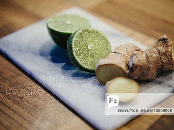 Sliced lime and cut ginger root