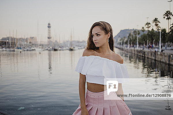 Portrait of a beautiful  fashionable woman at the harbour of Barcelona  Spain