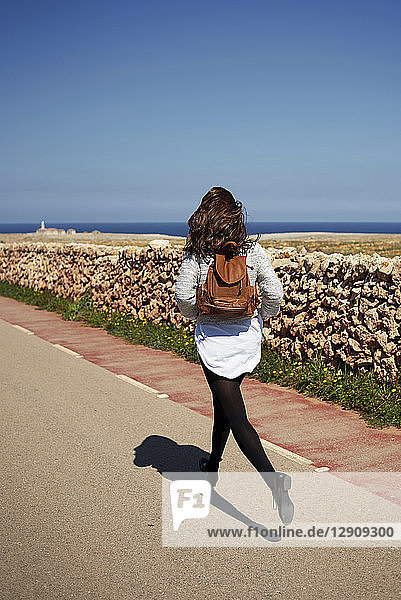 Young brunette woman running outdoor