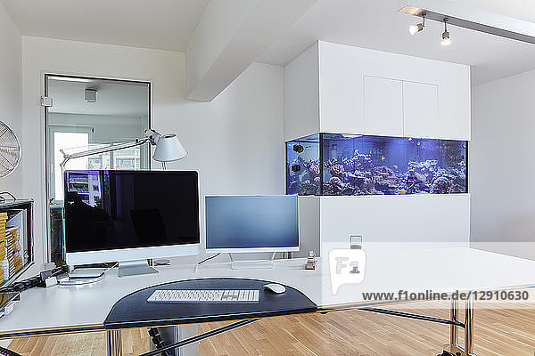 Interior of a modern office with aquarium