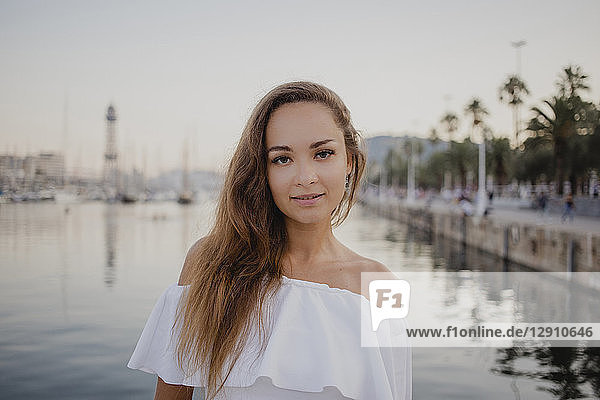 Portrait of a beautiful  fashionable woman at the harbour of Barcelona  Spain