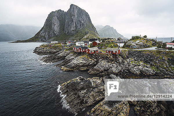 Norway  Lofoten  remote houses at rocky coast