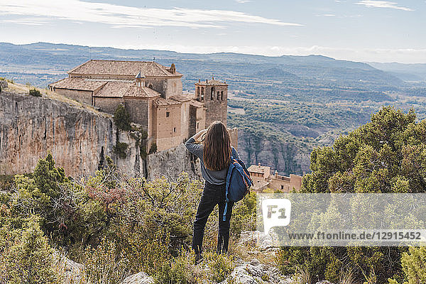 Spain  Alquezar  back view of young woman looking at view