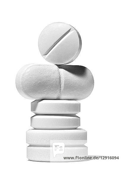 Stack of white pills  close-up