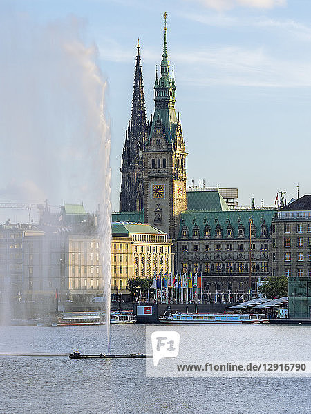 Germany  Hamburg  city hall and St Nikolai Memorial with Inner Alster and Alster fountain in the foreground
