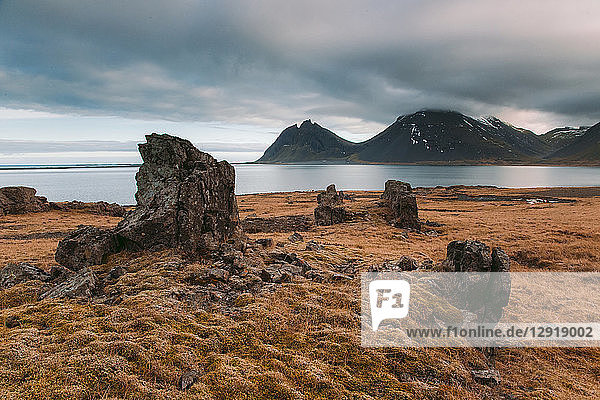 Scenic landscape of seashore at Stokksness Peninsula and Vestrahorn Mountains  Iceland