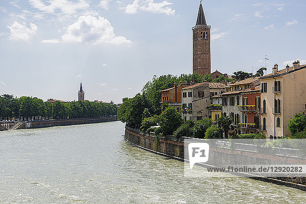 River view with river bank building  hilltop church and sanctuary of Madonna di Lourdes  Verona  Veneto  Italy  Europe