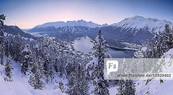 Panoramic of village and Lake of St. Moritz covered with snow  Engadine  Canton of Graubunden  Switzerland