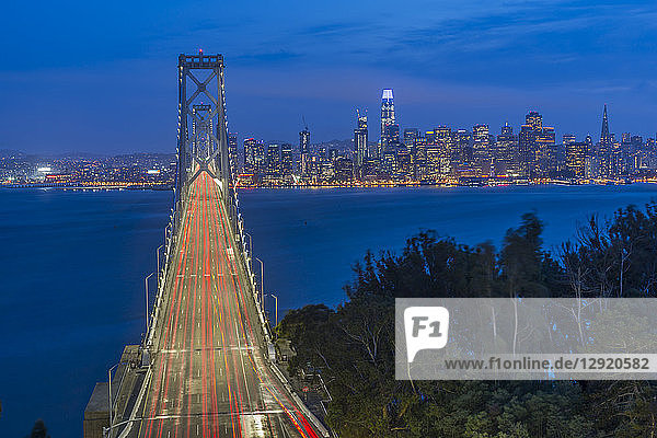 View of San Francisco skyline and Oakland Bay Bridge from Treasure Island at night  San Francisco  California  United States of America  North America