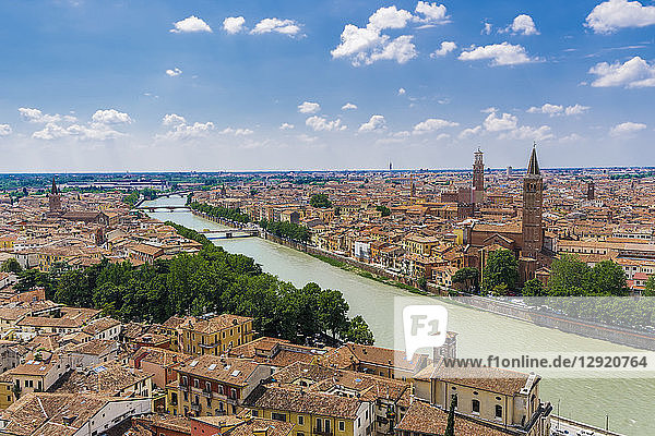Adige River view with bridges  traditional buildings and church bell towers on river banks  Verona  Veneto  Italy  Europe