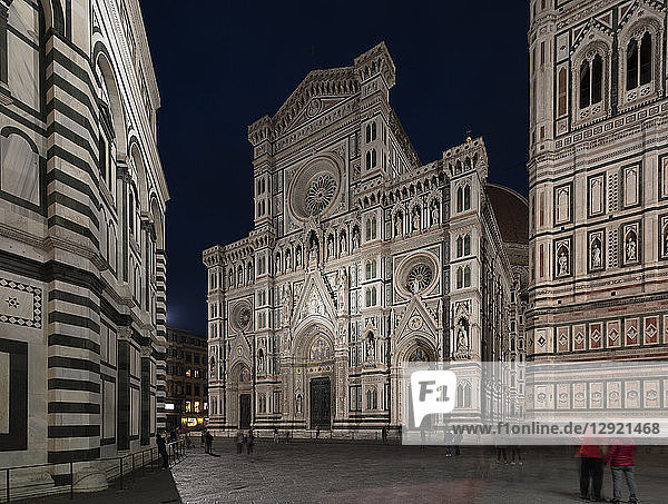 The neo-gothic marble facade of the Duomo (Cathedral) framed by the Campanile and Baptistry on an evening in Florence  UNESCO World Heritage Site  Tuscany  Italy
