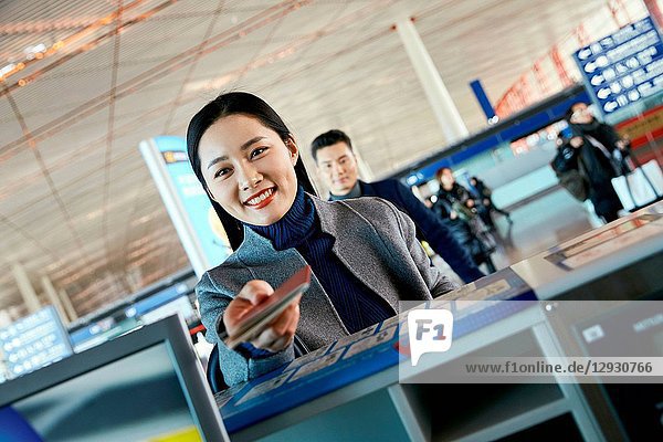 Business men and women at the airport