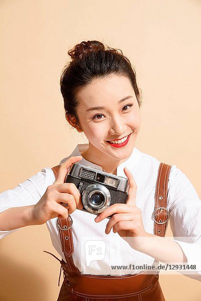 Young woman with the camera