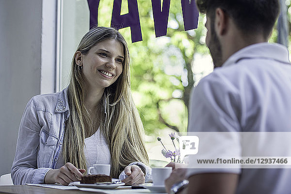 Couple sitting in cafe