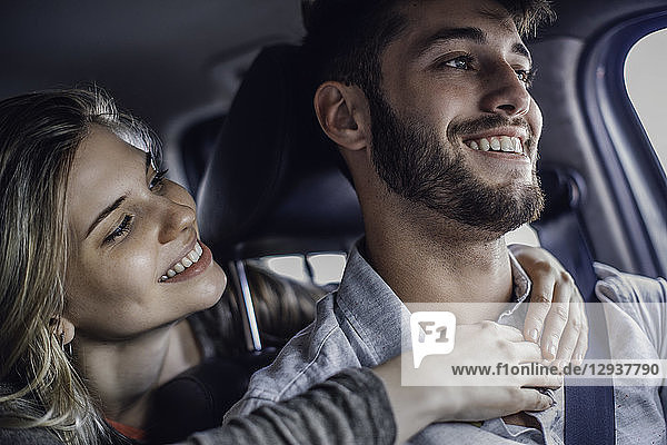 Couple traveling in car