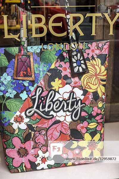 United Kingdom Great Britain England  London  Soho  Liberty Department Store  shopping  luxury brands upmarket  window display sale  floral totebag