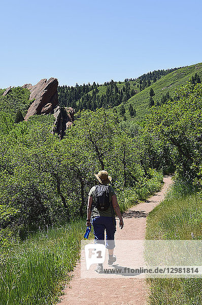 Woman hiking in Roxborough State Park  Colorado