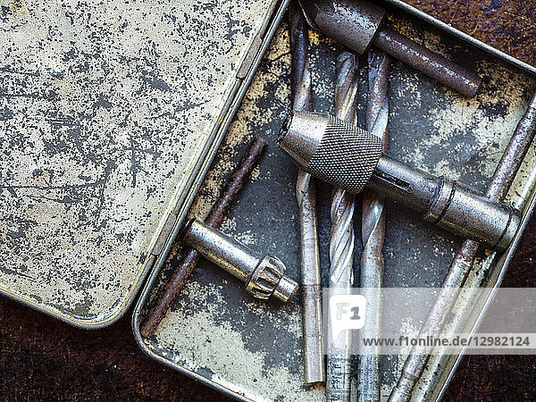 Drill bits in metal box