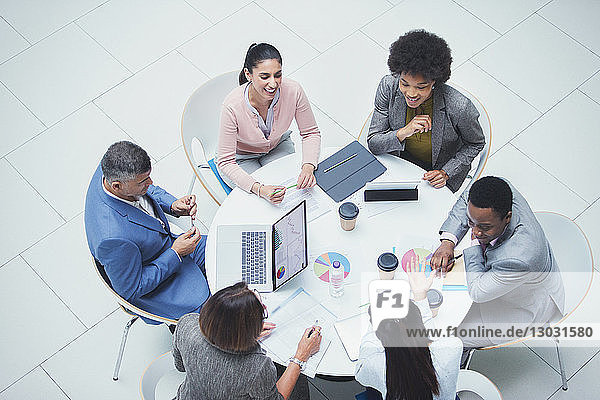 High angle view business people meeting at round table