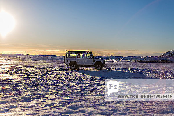 Four wheel drive vehicle in remote landscape  Iceland