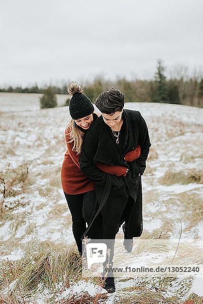 Couple hugging in snowy landscape  Georgetown  Canada
