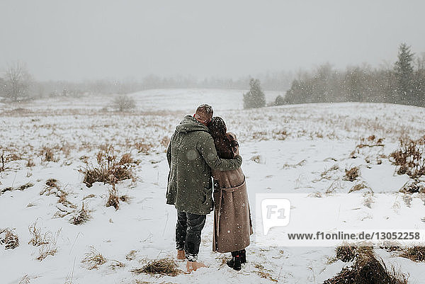 Couple enjoying snowy landscape  Georgetown  Canada