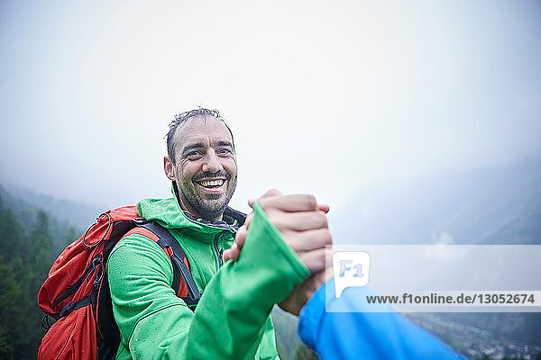 Hikers congratulating themselves  Mont Cervin  Matterhorn  Valais  Switzerland