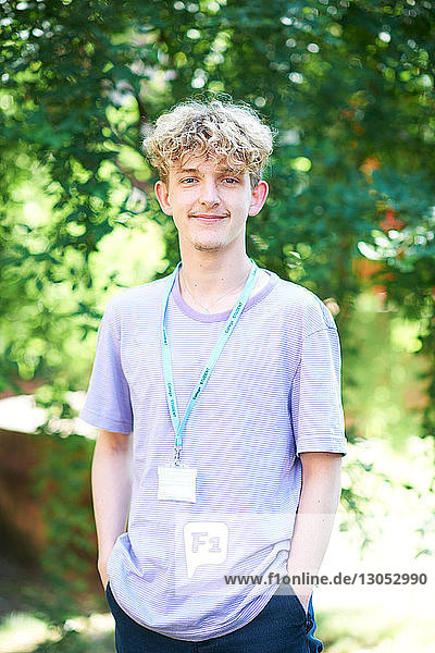 Young male higher education student on college campus  portrait
