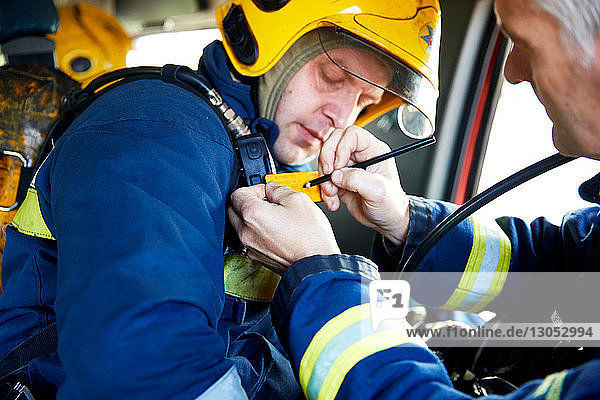 Fireman inside fire engine