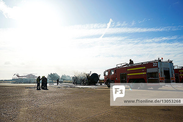 Firemen and fire engine in training centre  Darlington  UK