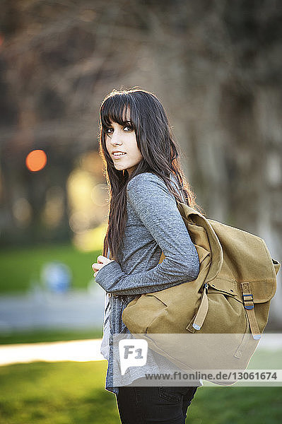 Portrait of woman with backpack