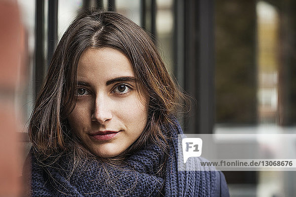 Close-up portrait of woman wearing scarf