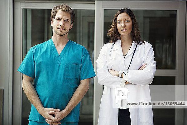 Portrait of doctors standing in hospital