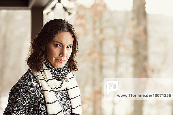 Portrait of confident woman in warm clothing