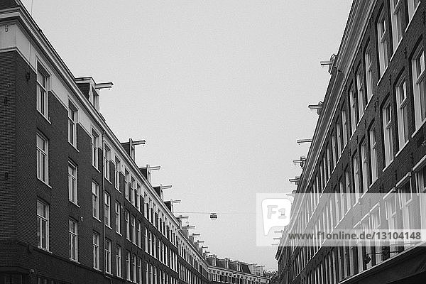 Row houses under overcast sky  Amsterdam  Netherlands  Holland