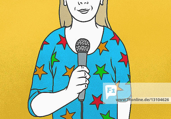 Woman wearing star-shaped shirt talking into microphone