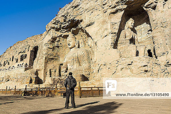 Carved Buddha statues at Yungang Grottoes  ancient Chinese Buddhist temple grottoes near Datong; China