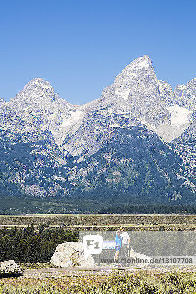 Tourists at viewpoint  Teton Range  Grand Teton National Park  Wyoming  United States of America