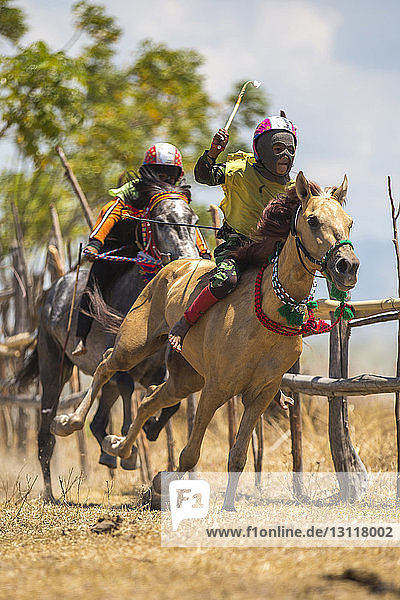 Child jockeys competing in traditional horse race