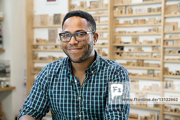 Portrait of confident businessman in office