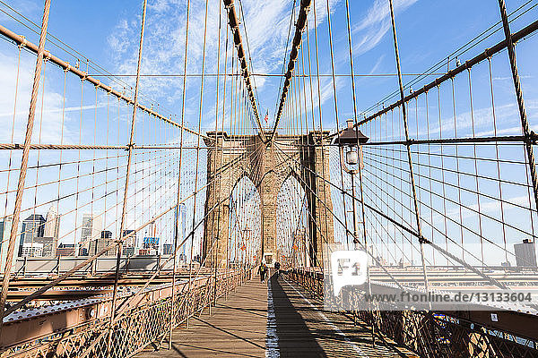 Brooklyn Bridge against sky in New York city