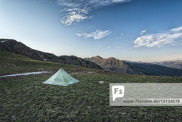 View of tent on mountain against sky