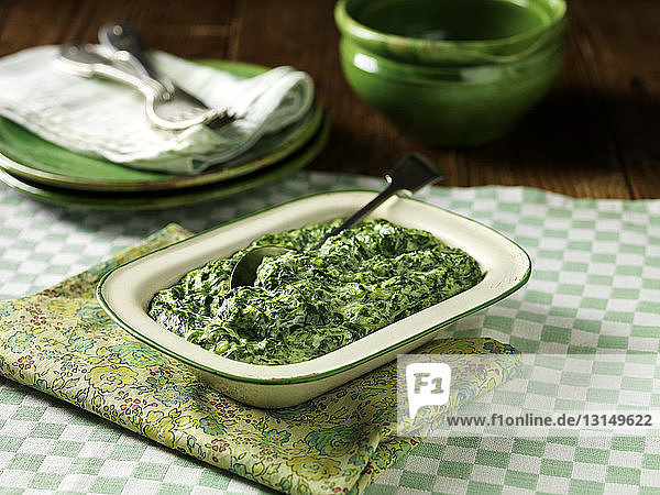 Creamed spinach in vintage tin