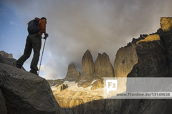 Man by Cordillera del Paine Torres del Paine National Park  Chile