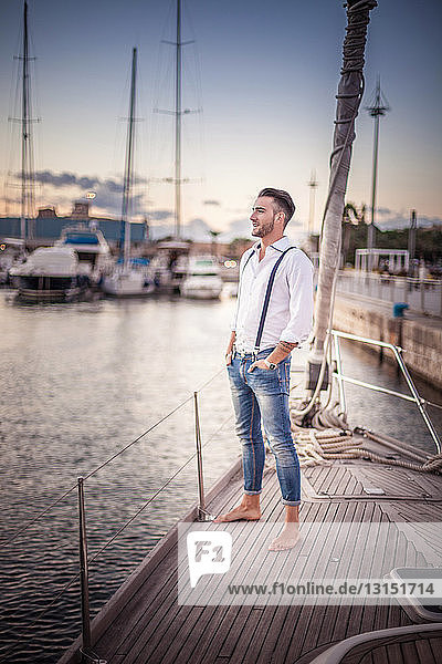 Young man relaxing on yacht  Cagliari  Sardinia  Italy